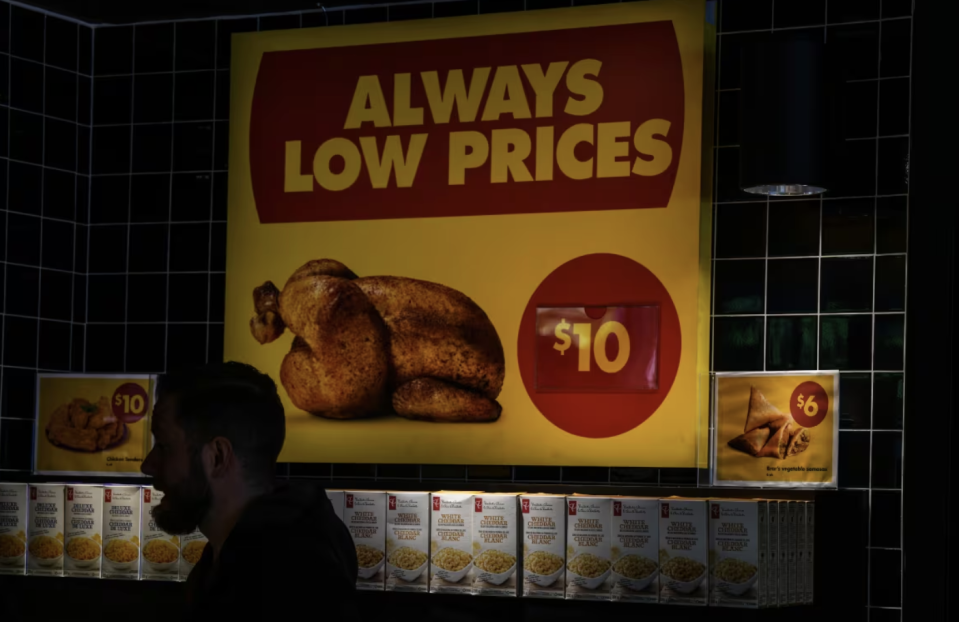 A sign advertising low prices at a grocery store in Toronto. On a GDP per capita basis, Canada has lost ground to peer countries like Australia, New Zealand and the United Kingdom. (Chris Young/Canadian Press)