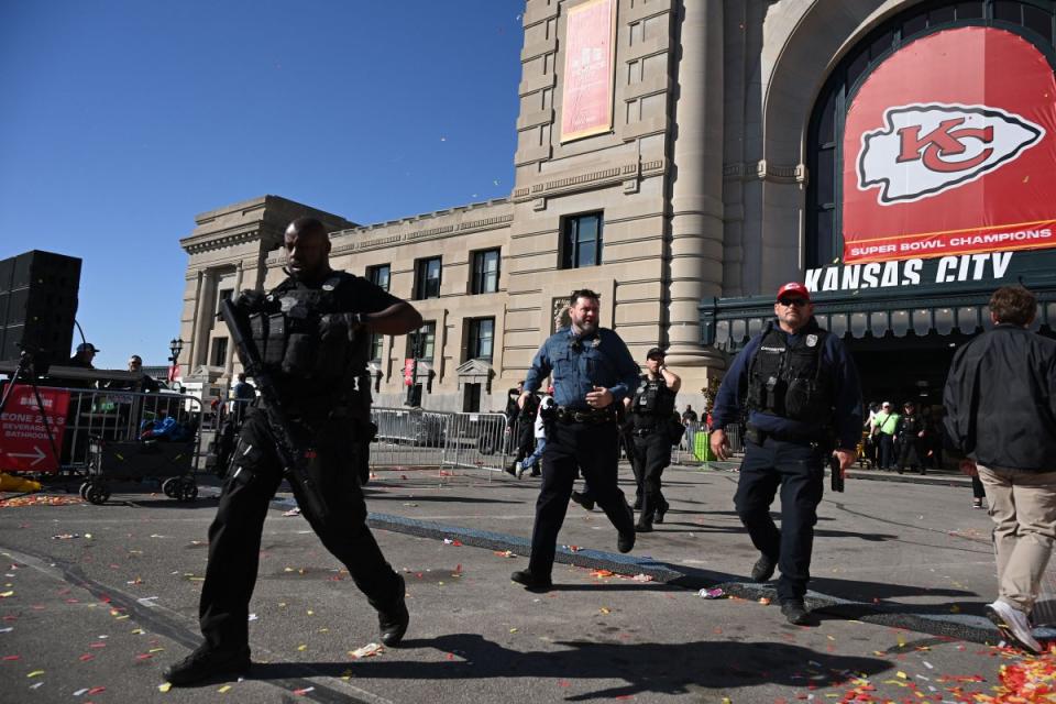 Police respond after shots were fired near the Kansas City Chiefs' Super Bowl LVIII victory parade in Kansas City, Mo., on Feb. 14, 2024.<span class="copyright">Andrew Caballero-Reynolds—AFP/Getty Images</span>