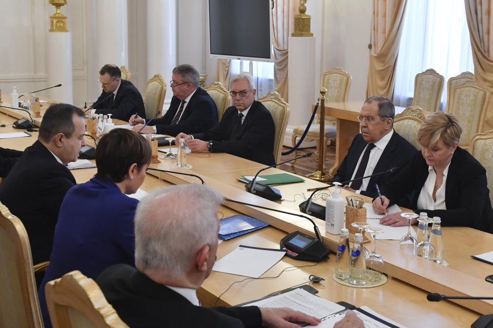 Russian Foreign Minister Sergey Lavrov, 2nd right, and his Serbian counterpart Ivica Dacic, third left, speak during their meeting in Moscow, Russia, Thursday, March 21, 2024. (Olga Maltseva /Pool Photo via AP)