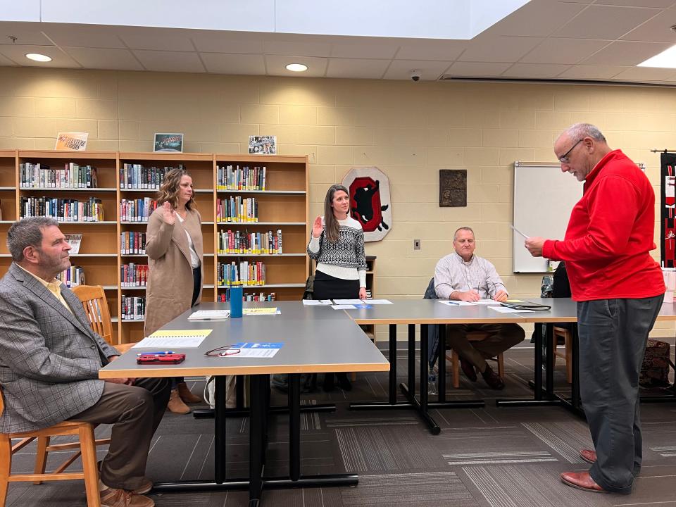 Megan Middleton, left, and Jamie Kovacs were sworn in as Orrville City Schools board members during the organizational meeting Wednesday