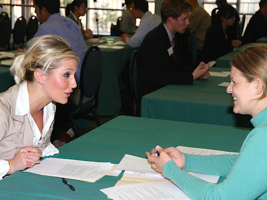 job interview woman lean in forward