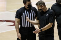 Alabama head coach Nate Oats argues with the referee, left, during the first half of an NCAA college basketball game against Mississippi State, Saturday, Jan. 23, 2021, in Tuscaloosa, Ala. (AP Photo/Vasha Hunt)