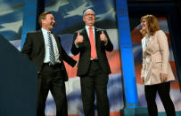 Representative Kevin Cramer (R-ND) with his wife Kris and state GOP chairman Rick Berg (L) attend the 2018 North Dakota Republican Party Convention in Grand Forks, North Dakota, U.S. April 7, 2018. Picture taken April 7, 2018. The party endorsed Cramer for the U.S. Senate race against Democratic Sen. Heidi Heitkamp. REUTERS/Dan Koeck