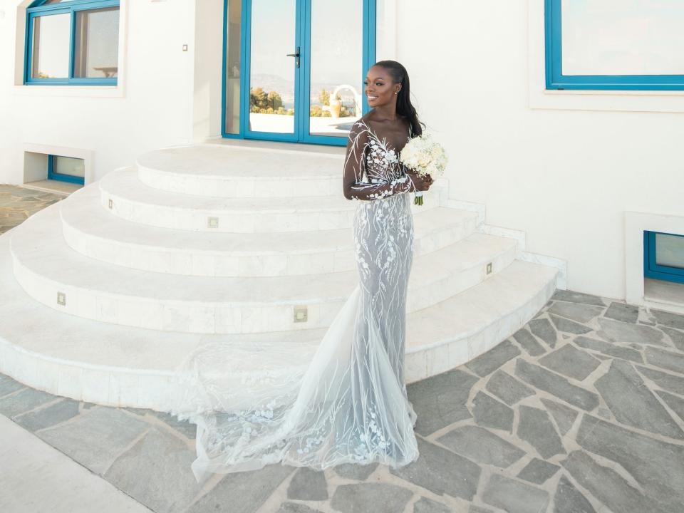 A bride looks over her shoulder on her wedding day.