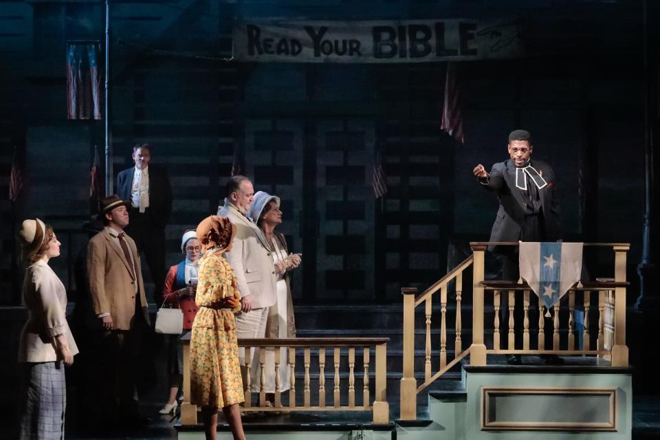 Curtis Bannister, right, plays a minister who captivates his congregation in “Inherit the Wind” at Asolo Repertory Theatre.