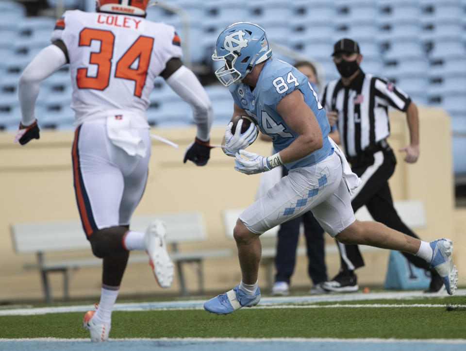 North Carolina's Garrett Walston (84) scores on a pass from quarterback Sam Howell in the first quarter of an NCAA college football game against Syracuse Saturday, Sept. 12, 2020 in Chapel Hill, N.C. (Robert Willett/The News & Observer via AP, Pool)