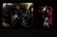 Passengers are pictured inside a public bus during the outbreak of the coronavirus disease (COVID-19) in Rio de Janeiro