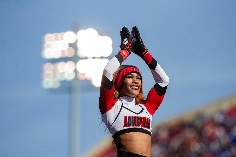 Louisville cheerleaders celebrated after a Louisville score during first half action as the Cardinals and Wildcats faced off for the Governor's Cup on Saturday afternoon at L&N Stadium in Louisville, Ky. Nov. 25, 2023.