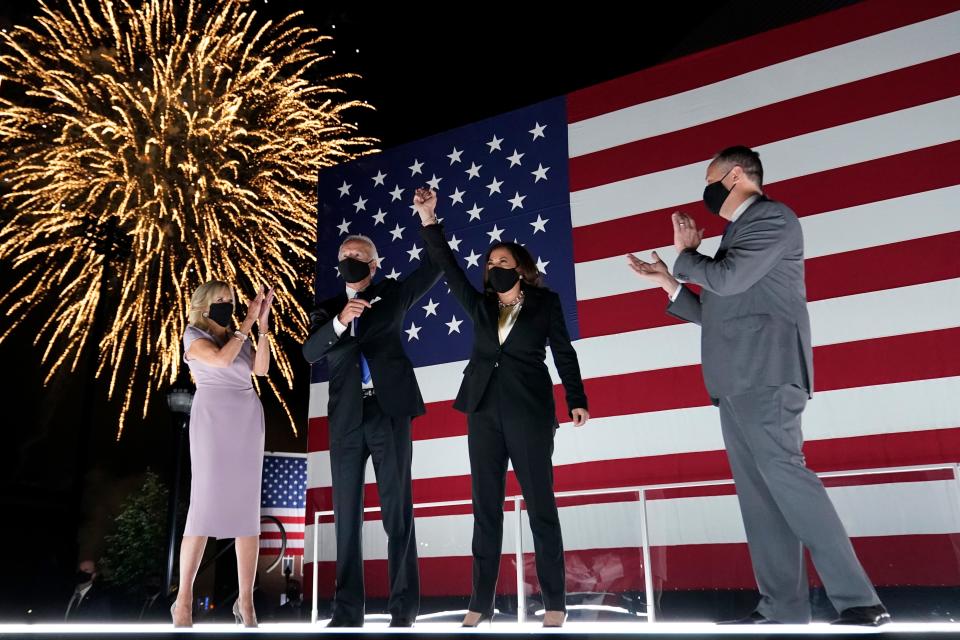 Democratic presidential candidate former Vice President Joe Biden, and his wife Jill Biden, watch fireworks with Democratic vice presidential candidate Sen. Kamala Harris, D-Calif., and her husband Doug Emhoff, during the fourth day of the Democratic National Convention, Thursday, Aug. 20, 2020, at the Chase Center in Wilmington, Del.