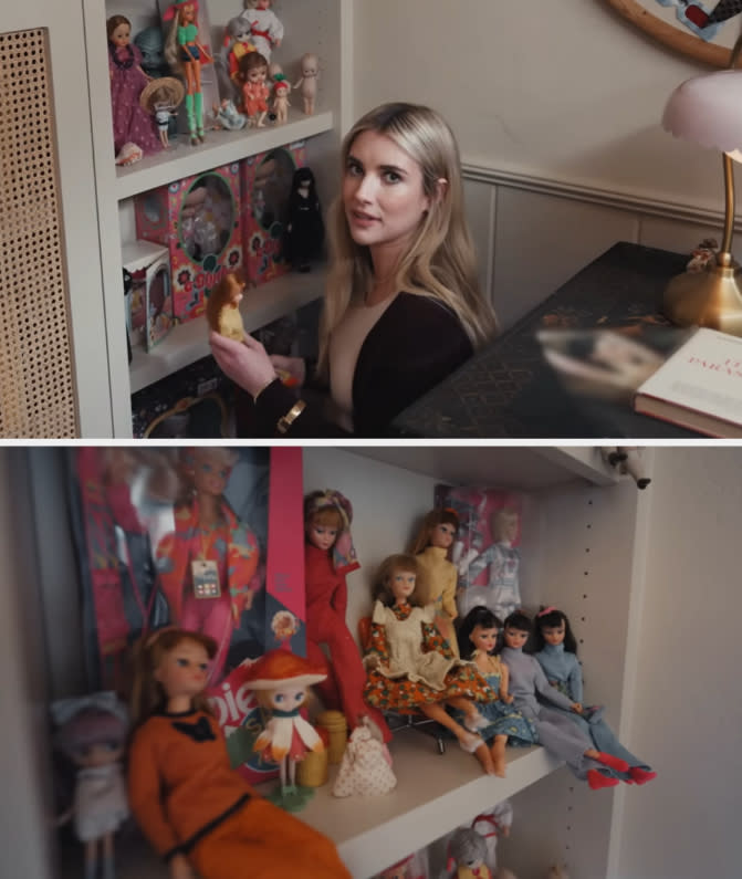 Emma Roberts showing her doll wall filled with dolls sitting on the shelf or in their original boxes