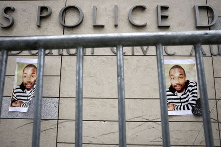 Posters of Ezell Ford hang outside the meeting of the Los Angeles Police Commission in Los Angeles, California June 9, 2015. REUTERS/Patrick T. Fallon