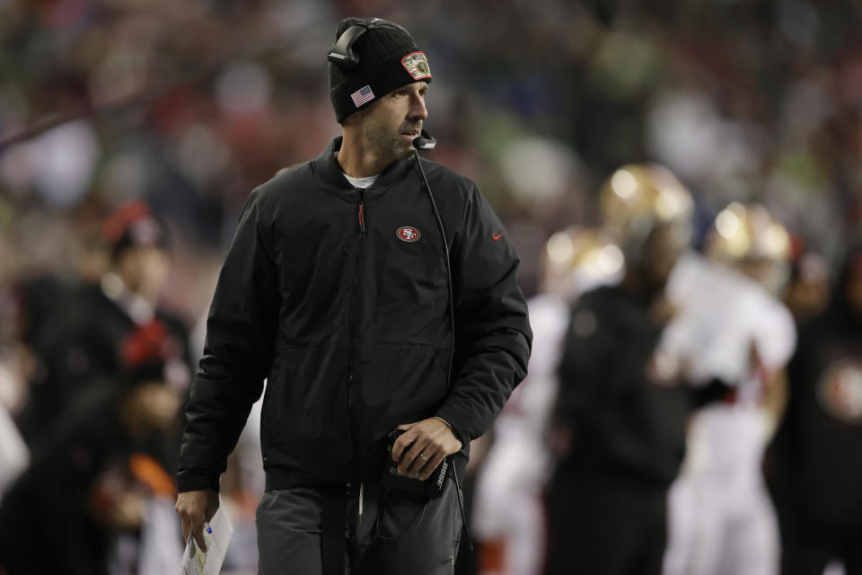 San Francisco 49ers head coach Kyle Shanahan looks from the sideline late in the second half of an NFL football game against the Seattle Seahawks, Sunday, Dec. 5, 2021, in Seattle. The Seahawks won 30-23. (AP Photo/John Froschauer)