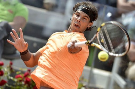 Spain's Rafael Nadal returns a ball during his quarter-finals match against Czech Republic's Tomas Berdych at the ATP Rome tournament. Nadal won 6-4, 7-5