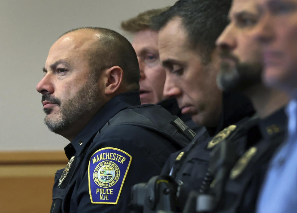 Members of the Manchester Police Department listens during to closing arguments in Adam Montgomery's trial, Wednesday, Feb. 21, 2024, in Manchester, N.H. Montgomery is accused of killing his 5-year-old daughter. (Jim Davis/The Boston Globe via AP, Pool)