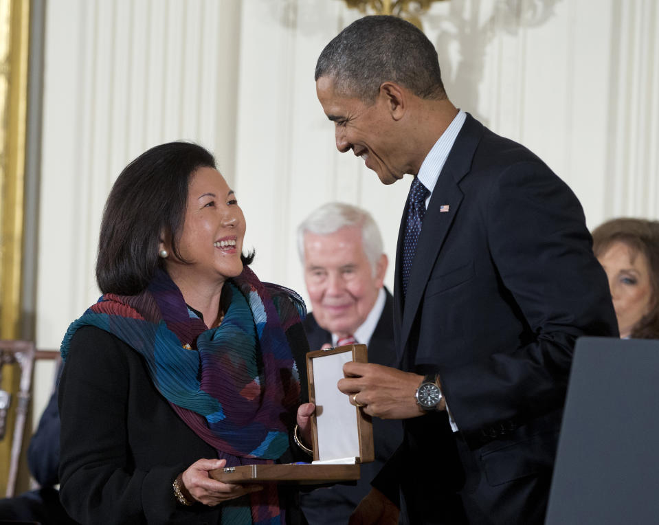 FILE - In this Nov. 20, 2013 file photo President Barack Obama talks with Irene Hirano in the East Room of the White House in Washington. Hirano Inouye, the widow of the late U.S. Sen. Daniel K. Inouye of Hawaii and the founding CEO of the Japanese American National Museum in Los Angeles, has died in Los Angeles on Tuesday, April 7, 2020, after an extended illness. She was 71. Hirano Inouye had most recently served as president of the U.S.-Japan Council, which aims to develop and connect leaders to strengthen the U.S.-Japan relationship. (AP Photo/ Evan Vucci,File)