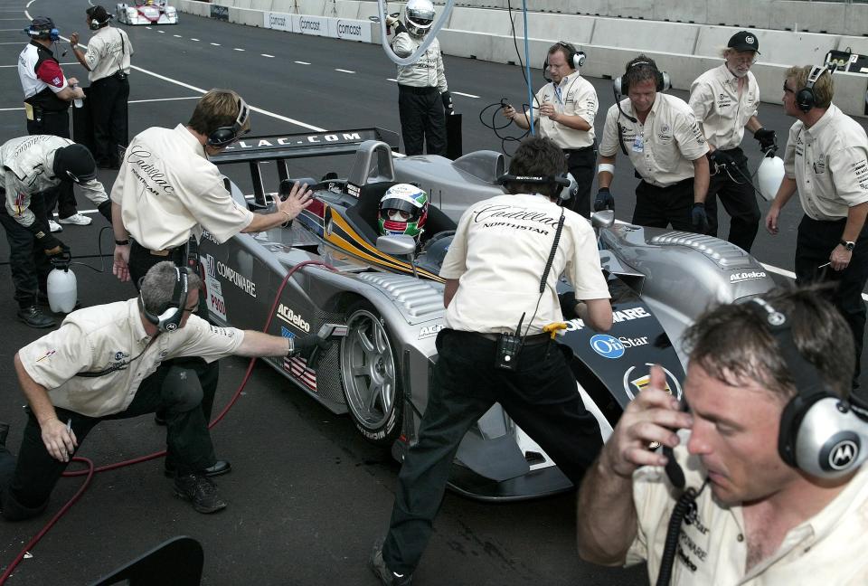 WASHINGTON, : American Le Mans Series driver Max Angelelli (in a Cadillac Northstar LMP 02) from Team Cadillac Compuware stops for a pit stop during a qualyifing round for the Cadillac Grand Prix in Washington, DC, 20 July 2002. The race is scheduled for 21 July 2002. AFP PHOTO/Luke FRAZZA (Photo credit should read LUKE FRAZZA/AFP via Getty Images)