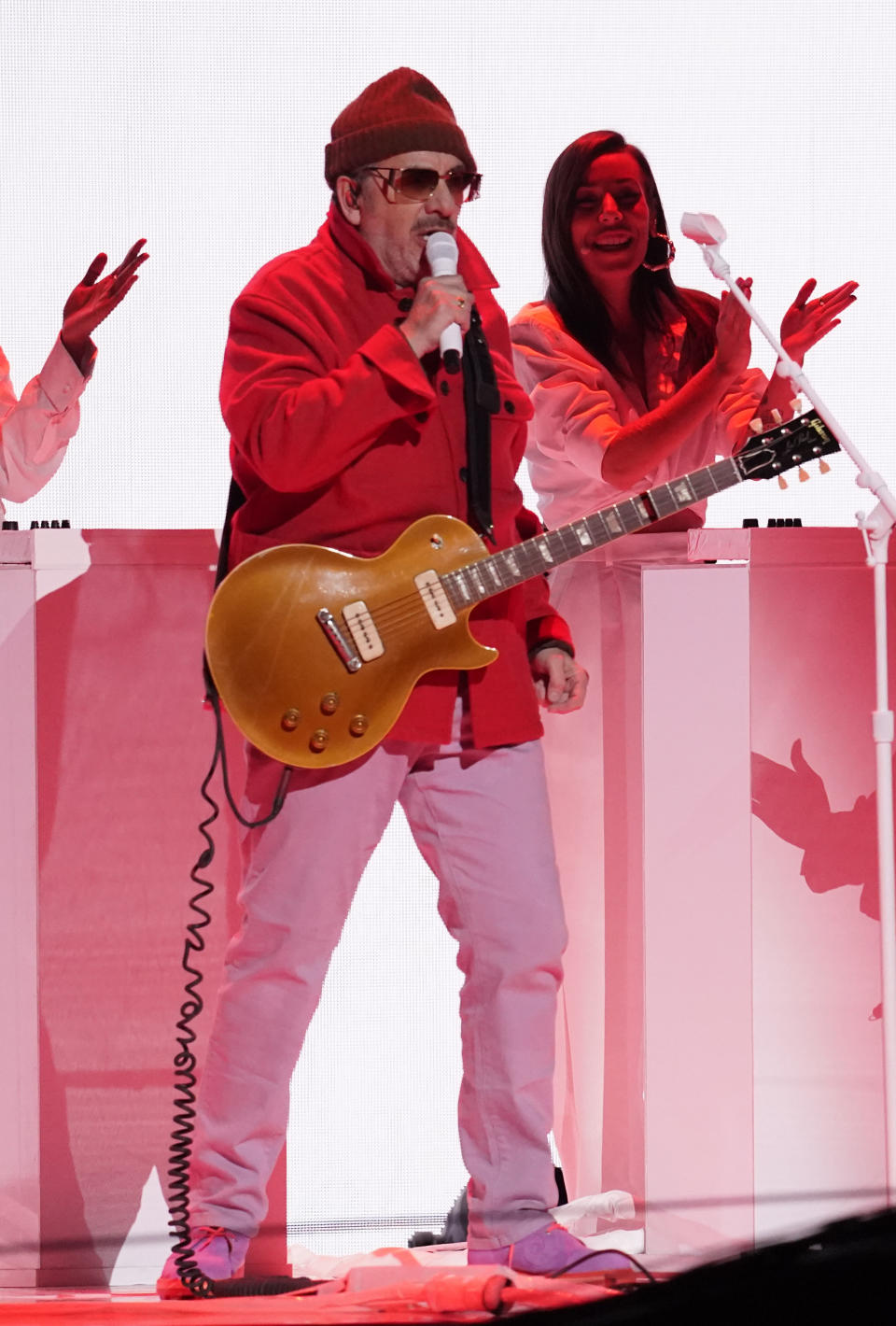 Elvis Costello performs "Tocarte" at the 23rd annual Latin Grammy Awards at the Mandalay Bay Michelob Ultra Arena on Thursday, Nov. 17, 2022, in Las Vegas. (AP Photo/Chris Pizzello)