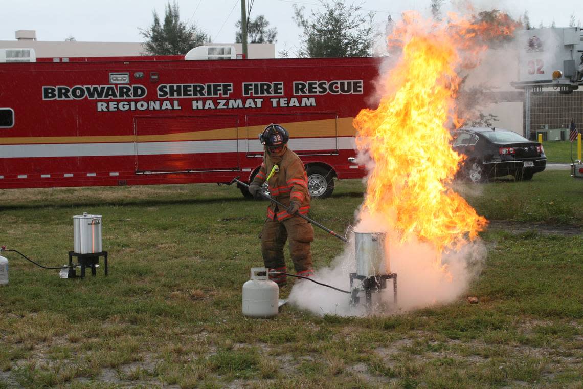 In a demonstration, a Broward firefighter lowers a frozen turkey into a a pot of oil in a propane-fueld fryer.
At the time, the fire chief said:  “We urge people who enjoy deep fried turkey to purchase one prepared by a professional, like a grocery store or restaurant. The risks of consumer grade turkey fryers are evident and can cause serious burns and devastating injuries. What you have is five gallons of 400-plus degree oil in a pot that can easily splash, tip or get knocked over.”