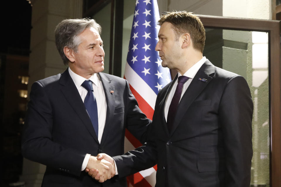 U.S. Secretary of State Antony Blinken, left, is greeted by North Macedonia's Foreign Minister Bujar Osmani upon his arrival at the foreign ministry building in Skopje, North Macedonia, on Wednesday, Nov. 29, 2023. Secretary Blinken is on a brief visit to Skopje, North Macedonia, to attend the OSCE (Organization for Security and Co-operation in Europe) meeting. (AP Photo/Boris Grdanoski)