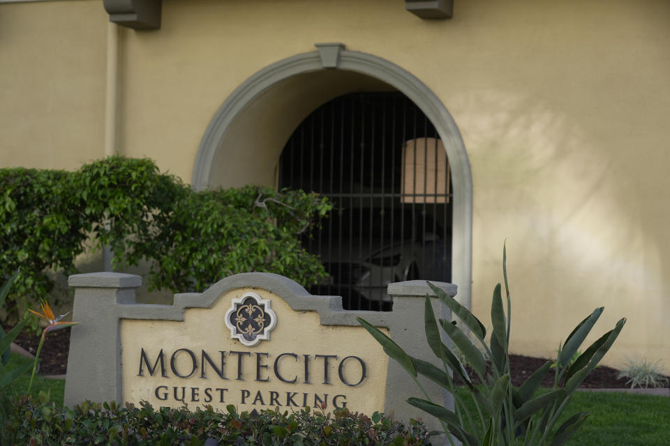 The exterior of the Montecito Apartments complex is pictured in Los Angeles, Wednesday, April 10, 2024. Danielle Cherakiyah Johnson, a woman who authorities say fatally stabbed her partner inside their home in the complex Monday then threw her two children from a moving SUV onto the freeway, killing her infant daughter, appeared to be agitated by the impending eclipse. (AP Photo/Damian Dovarganes)