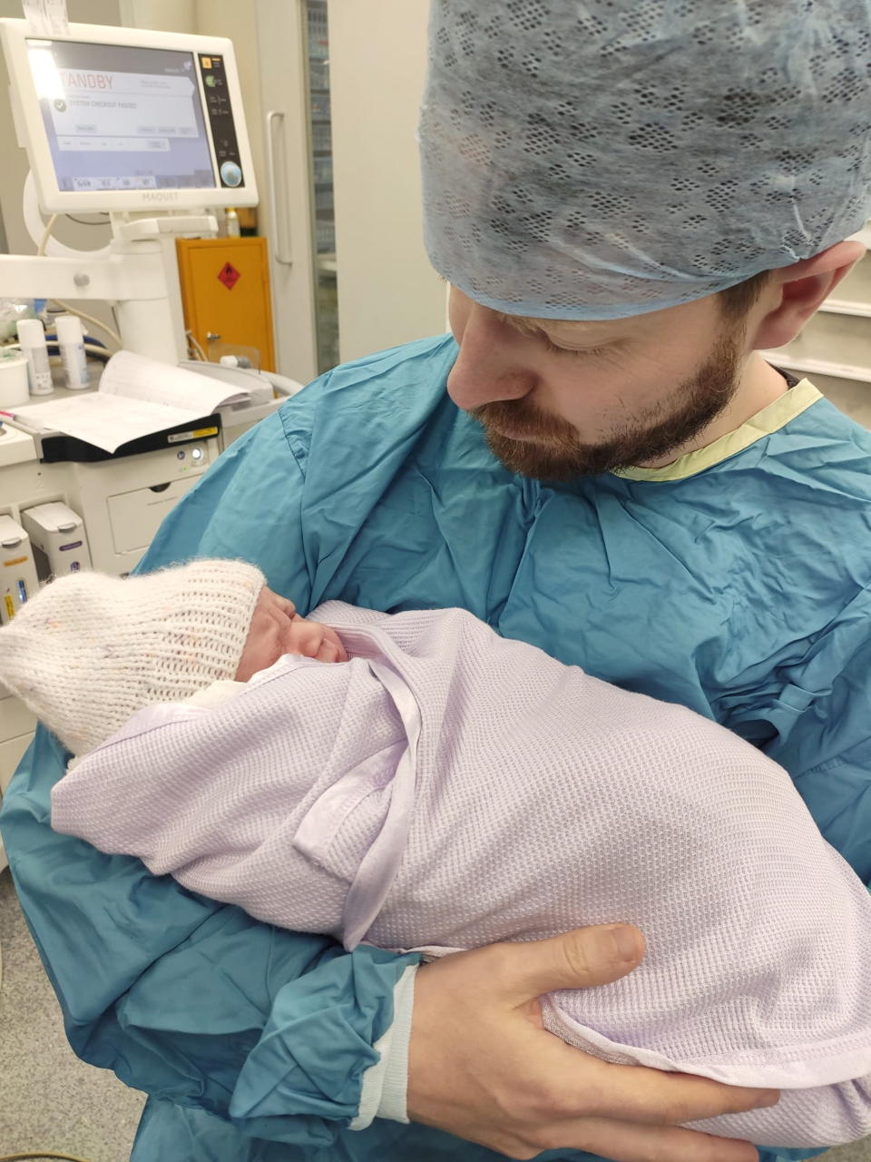 Richard Leaning, with son, Nathaniel, shortly after his birth in April 2022. (TFP Fertility UK/SWNS)