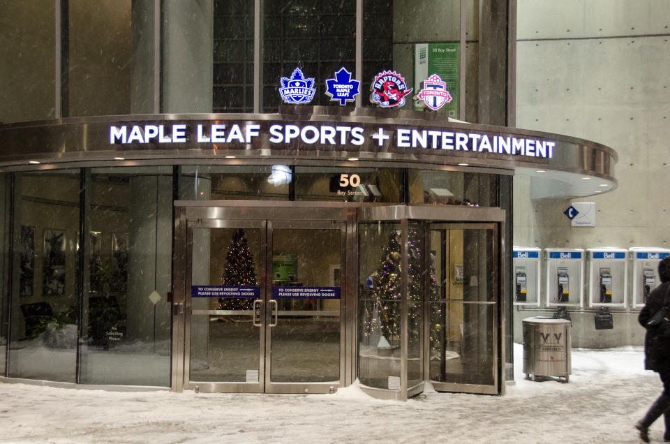 TORONTO, ONTARIO, CANADA - 2013/12/14: The Maple Leaf Sports and Entertainment office on a snowy day  with decorated Christmas trees inside. It is a professional sports and commercial real estate company based in Toronto located at the Air Canada Centre at 50 Bay St. (Photo by Roberto Machado Noa/LightRocket via Getty Images)