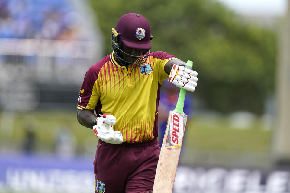 West Indies' Devon Thomas walks off after bring bowled by India's Axar Patel during the fifth and final T20 cricket match, Sunday, Aug. 7, 2022, in Lauderhill, Fla. (AP Photo/Lynne Sladky)