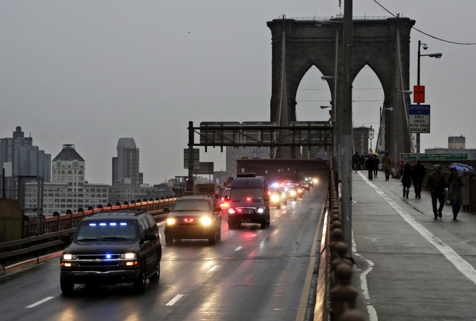 A caravan of police vehicles shuttles Mexican drug kingpin Joaquin "El Chapo" Guzman across the Brooklyn Bridge from a court appearance in Brooklyn to a Manhattan jail facility, Friday, Jan. 20, 2017, in New York. Guzman was extradited Thursday from Mexico. Prosecutors have sought to bring him to a U.S. court for years while he made brazen prison escapes and spent years on the run in Mexico. (AP Photo/Mark Lennihan)