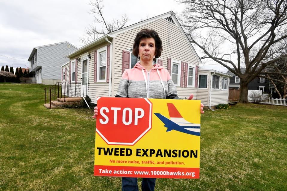 Bradley stands outside of her home, where in previous decades she says she never had issues from the airport. Matthew McDermott