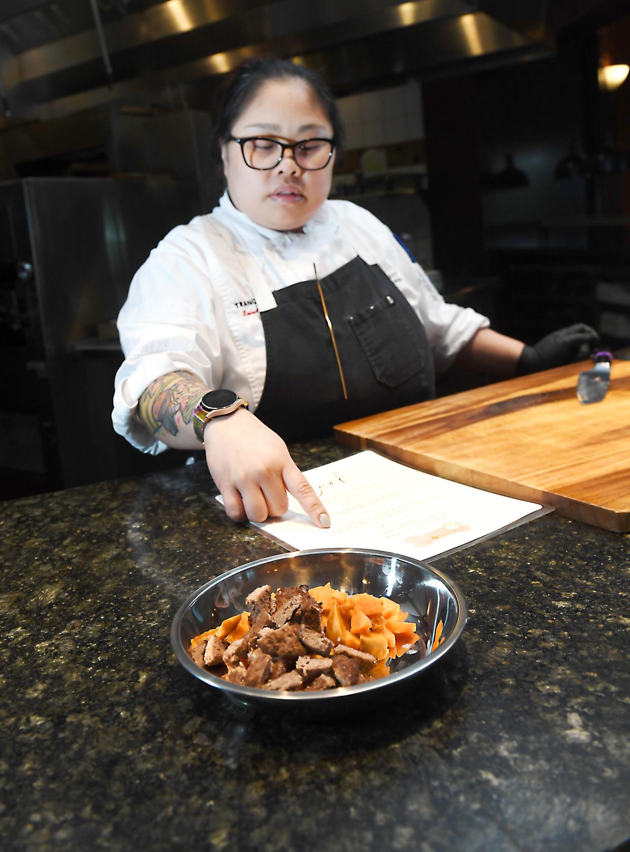 Trang Thu Pitts, Spartanburg Marriott's, executive Chef, talks about making dog friendly meals at the hotel on May 17, 2024.