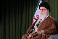 In this picture released by an official website of the office of the Iranian supreme leader, Supreme Leader Ayatollah Ali Khamenei addresses the nation in a televised speech in Tehran, Iran, Thursday, April 9, 2020. Iran's supreme leader suggested Thursday that mass gatherings in the Islamic Republic may be barred through the holy Muslim fasting month Ramadan amid the coronavirus pandemic. (Office of the Iranian Supreme Leader via AP)