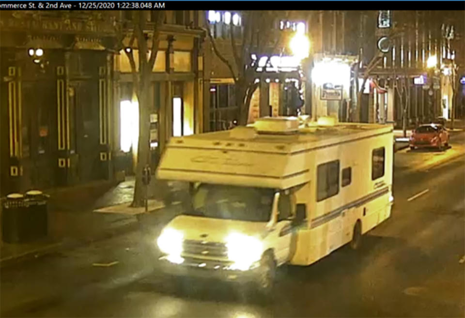 This image taken from surveillance video provided by Metro Nashville PD shows a recreational vehicle that was involved in a blast on Friday, Dec. 25, 2020 in Nashville, Tenn. An explosion shook the largely deserted streets early Christmas morning, shattering windows, damaging buildings and wounding some people. Police were responding to a report of shots fired when they encountered a recreational vehicle blaring a recording that said a bomb would detonate in 15 minutes, Metro Nashville Police Chief John Drake said. Police evacuated nearby buildings and called in the bomb squad. (Metro Nashville PD via AP)
