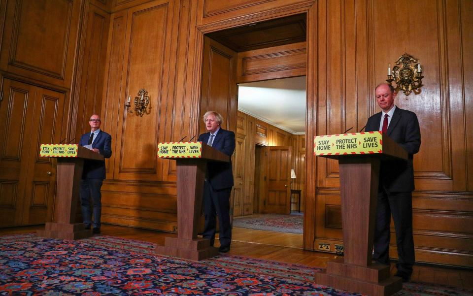 Britain's Prime Minister Boris Johnson (C), Britain's Chief Medical Officer for England Chris Whitty (R) and Britain's Chief Scientific Adviser Patrick Vallance  -  HANNAH MCKAY/AFP