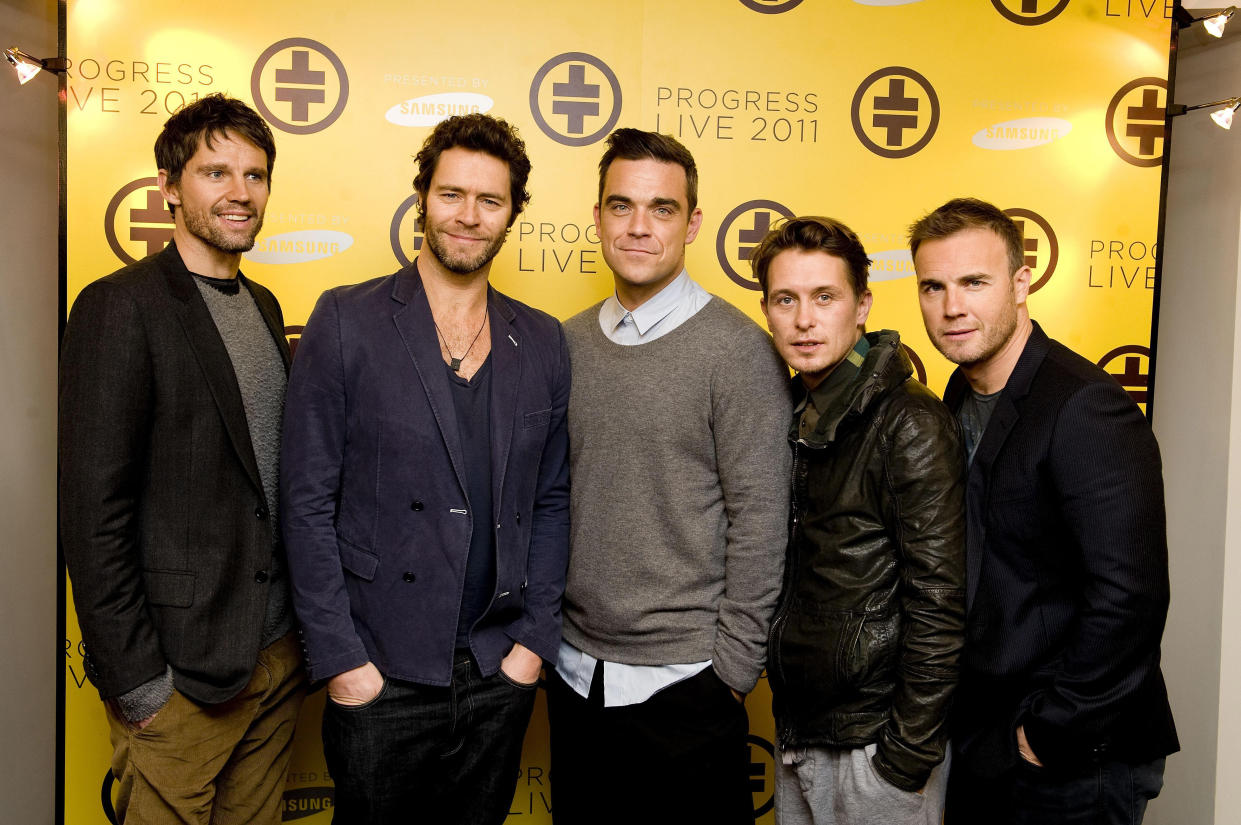 (From the left) Jason Orange, Howard Donald, Robbie Williams, Mark Owen and Gary Barlow of Take That during a photocall in London, where they announced their first tour as a complete group in 16 years.