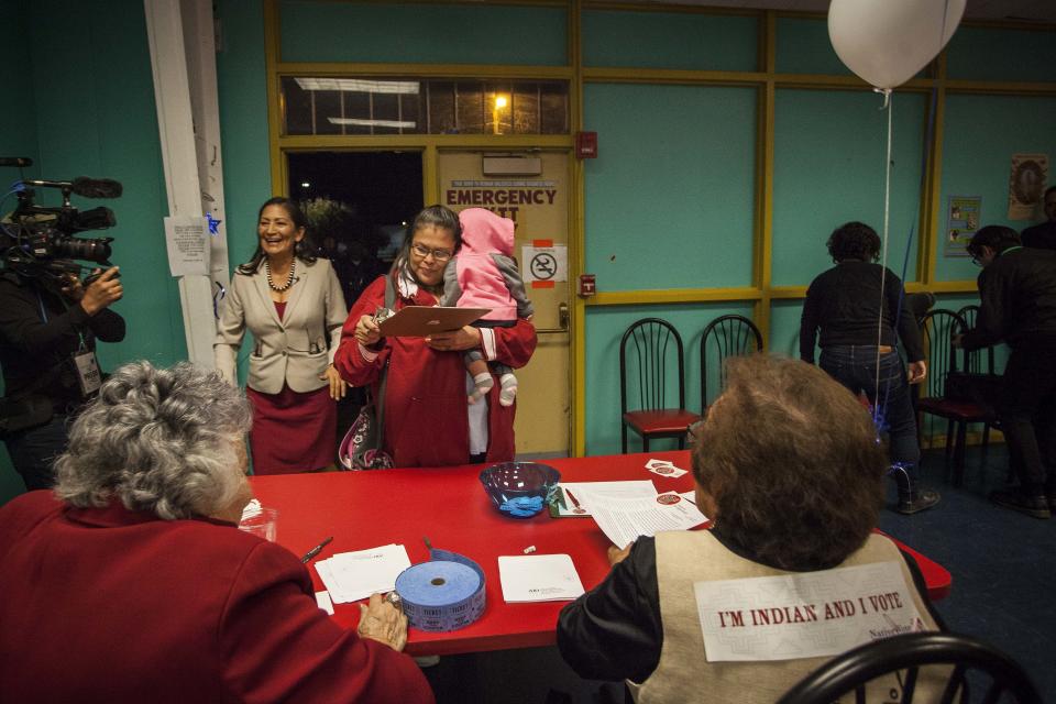 New Mexico congressional candidate Deb Haaland visits the Albuquerque Indian Center for the Native Vote Celebration in Albuquerque, New Mexico midterms election night Tuesday, Nov. 6, 2018. (AP Photo/Juan Labreche)