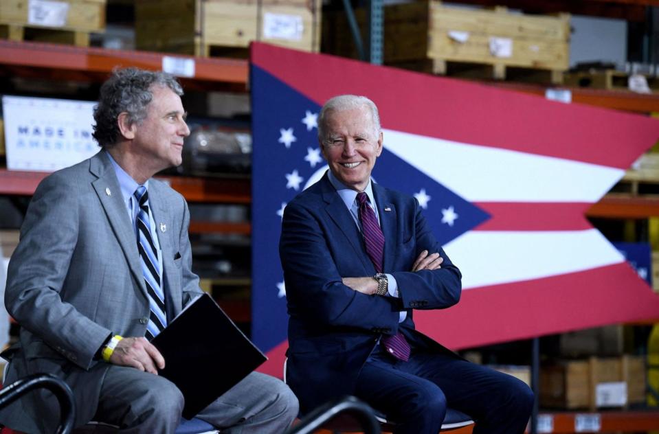 PHOTO: In this May 6, 2022, file photo, Senator Sherrod Brown and President Joe Biden visit United Performance Metals, a specialty metals solutions center, in Hamilton, Ohio. (Olivier Douliery/AFP via Getty Images, FILE)