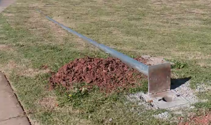 Flagpole knocked over by storm.