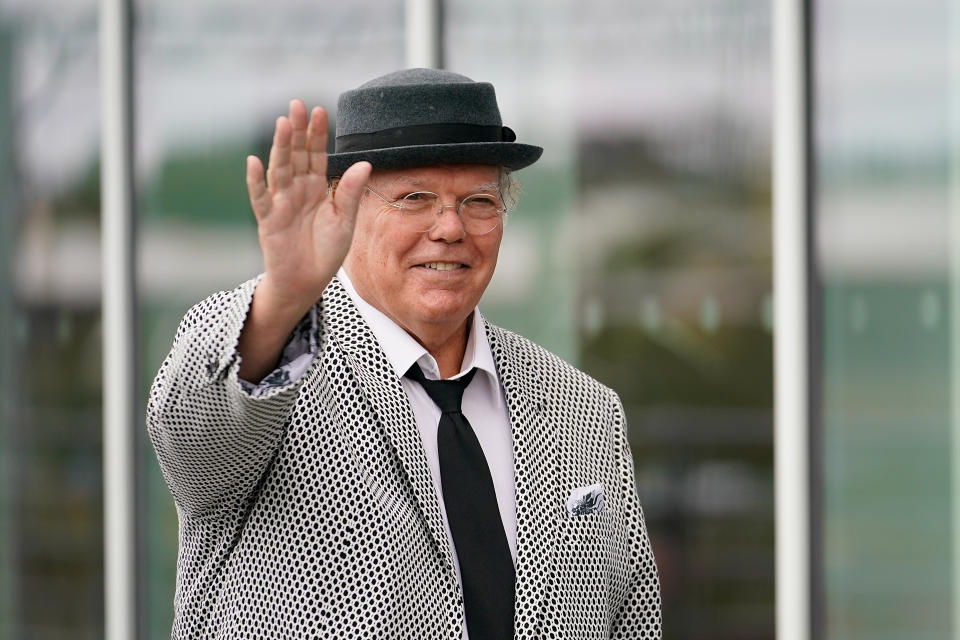 Comedian Roy Chubby Brown arrives for the funeral service of Barry Chuckle