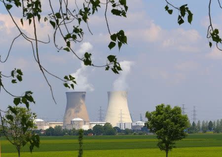 Steam billows from the cooling towers of a nuclear plant in Doel, near Antwerp in this June 5, 2013 file photo. REUTERS/Yves Herman/Files