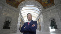 Utah Treasurer Marlo Oaks poses for a photograph at the Utah State Capitol on May 5, 2022, in Salt Lake City. A growing number of Republican-led states with economies that rely heavily on fossil fuels are pushing back against shifts in the financial industry to consider new factors such as environmental risk in their investment decisions. (AP Photo/Rick Bowmer)