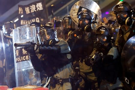 Police officers are seen during an anti-extradition bill protest in Causeway Bay, Hong Kong