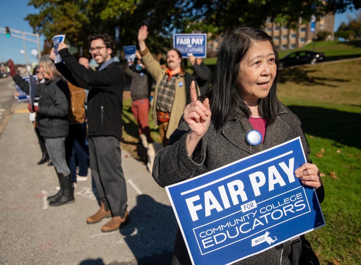 English professor Margaret Wong speaks about teacher pay during a protest in front of Quinsigamond Community College Thursday. Wong is chapter president of the teachers union at QCC.