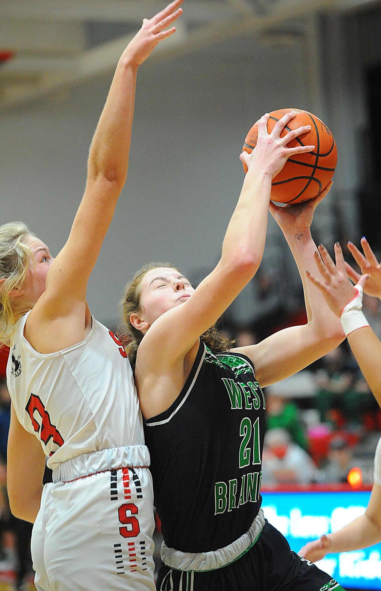 West Branch's Sophia Gregory is guarded by Salem's Kami Rohm in an Eastern Buckeye Conference game Saturday, January 22, 2022 at Salem High School.