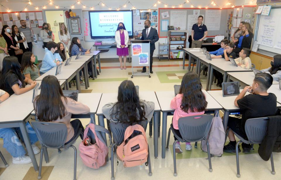 California Superintendent of Public Instruction Tony Thurmond (at podium) and state Sen. Monique Limón, D-Santa Barbara, meet with a class of sixth-grade students at  Juan Soria Elementary School in Oxnard on Tuesday, April 12, 2022. The two visited the school to help promote Senate Bill 952, which would expand funding for dual-language immersion programs.