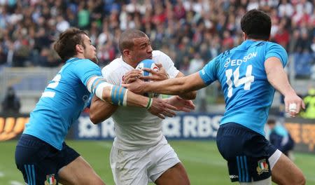 Rugby Union - Italy v England - RBS Six Nations Championship 2016 - Stadio Olimpico, Rome, Italy - 14/2/16 Jonathan Joseph beats Italy's Leonardo Sarto (R) and Edoardo Padovani to score the fourth try for England and complete his hat trick Reuters / Alessandro Bianchi Livepic