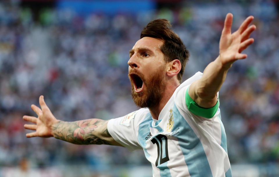 <p>GOOOOAAAAL: Lionel Messi celebrates putting Argentina ahead </p>