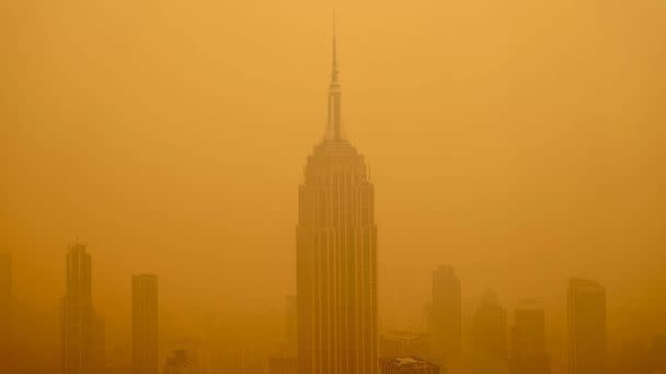 PHOTO: A smoky haze from wildfires in Canada diminishes the visibility of the Empire State Building, June 7, 2023, in New York. (David Dee Delgado/Getty Images)