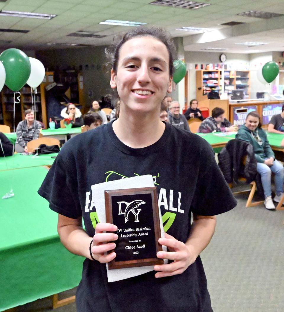 Dennis-Yarmouth Unified Sports partner Chloe Azoff receives her plaque during the banquet in the school library on Dec. 13.