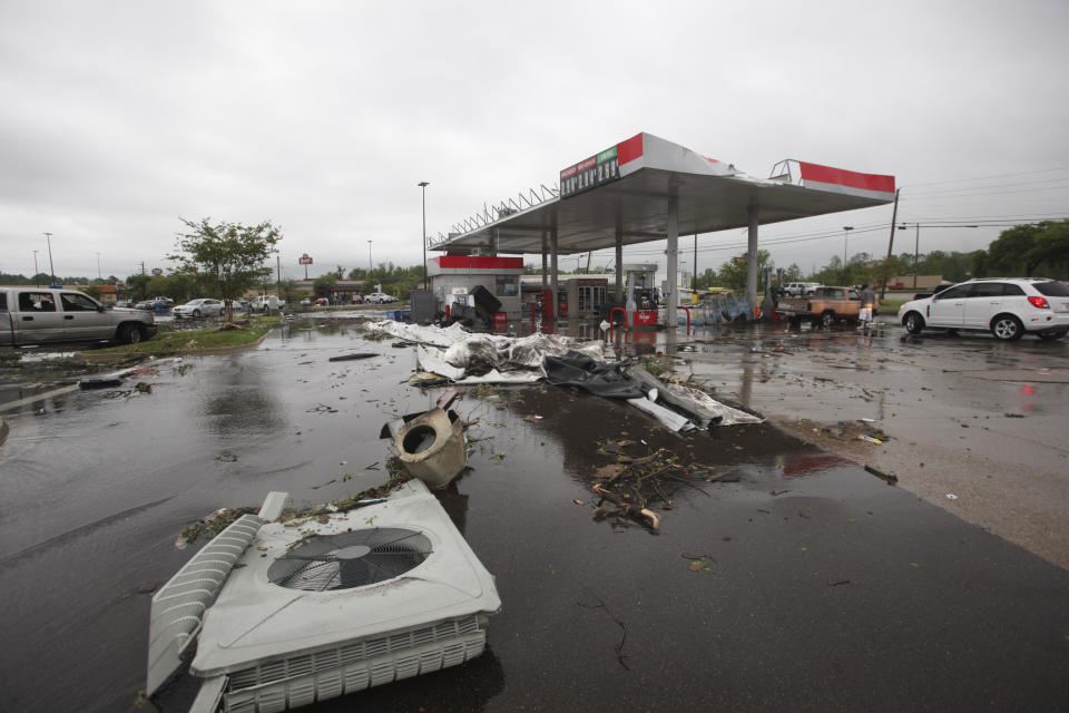 A gas station is damaged following severe weather, Saturday, April 13, 2019 in Vicksburg, Miss. Authorities say a possible tornado has touched down in western Mississippi, causing damage to several businesses and vehicles. John Moore, a forecaster with the National Weather Service in Jackson, says a twister was reported Saturday in the Vicksburg area of Mississippi and was indicated on radar. (Courtland Wells/The Vicksburg Post via AP)