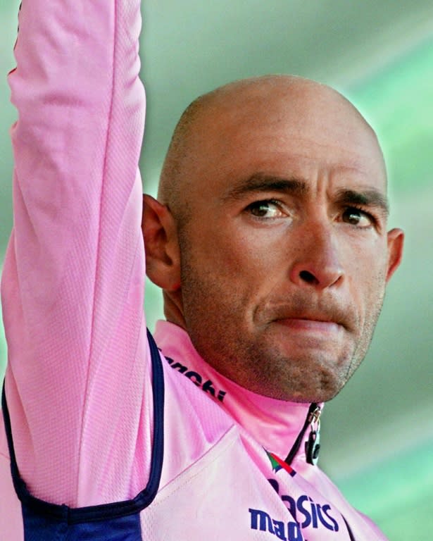 Italian cycling great Marco Pantani acknowledges supporters after winning a Tour de France stage in Courchevel, in the Alps, in July 2000